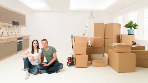 Local movers handling a grand piano move for a property in Ilford